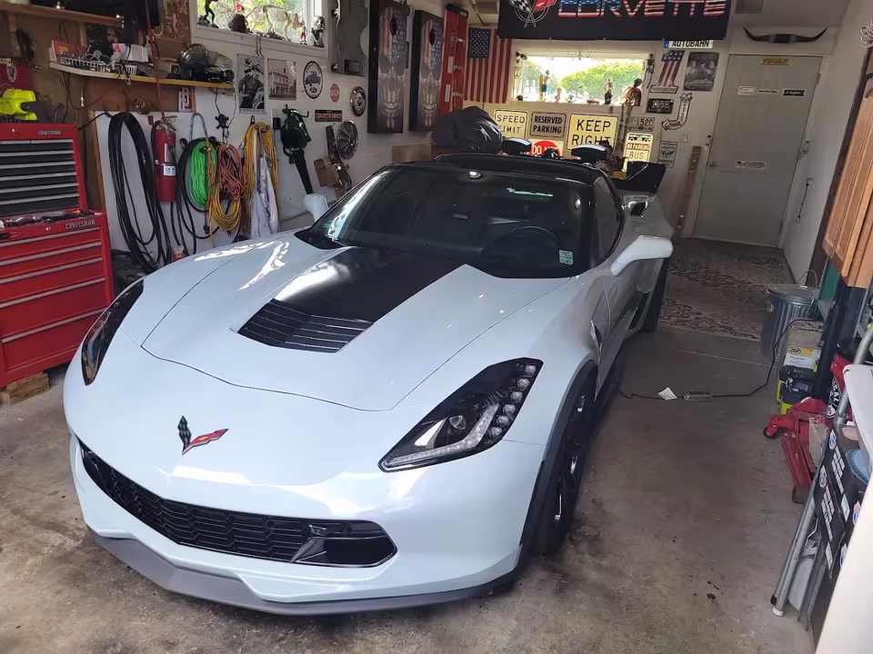 White Chevrolet Corvette in the garage at Clean Tint